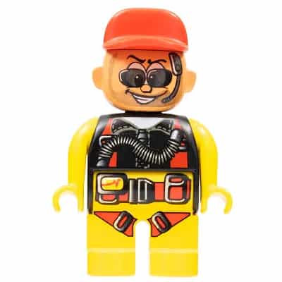 Duplo Figure, Male Action Wheeler, Yellow Legs, Yellow Top with Yellow/Black/Red Parachute, Red Cap, Beard, Sunglasses and Headphone